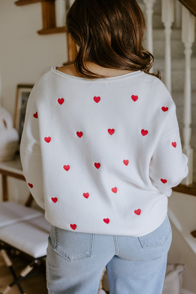 White Sweater with Red Hearts
