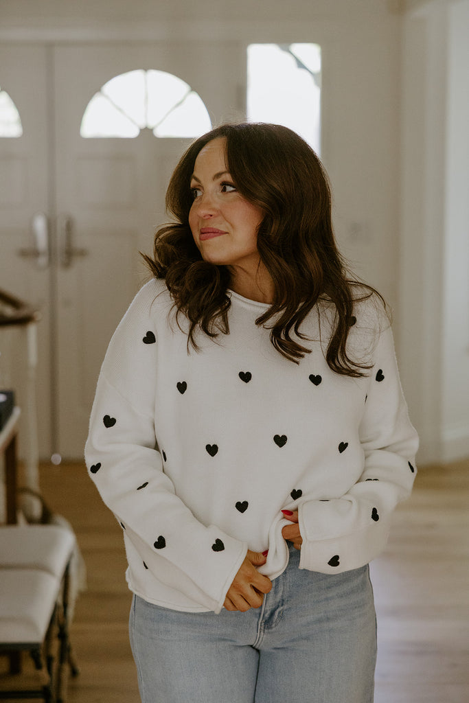 White Sweater with Black Hearts