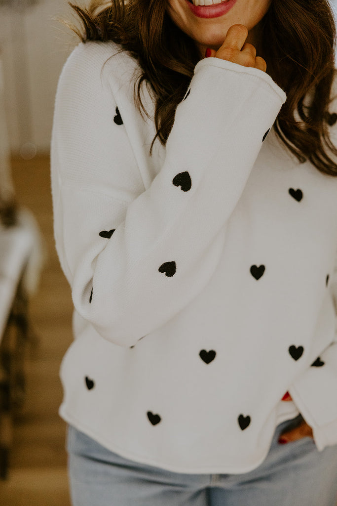 White Sweater with Black Hearts