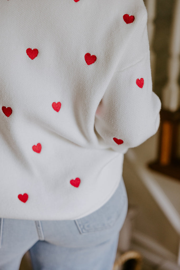 White Sweater with Red Hearts