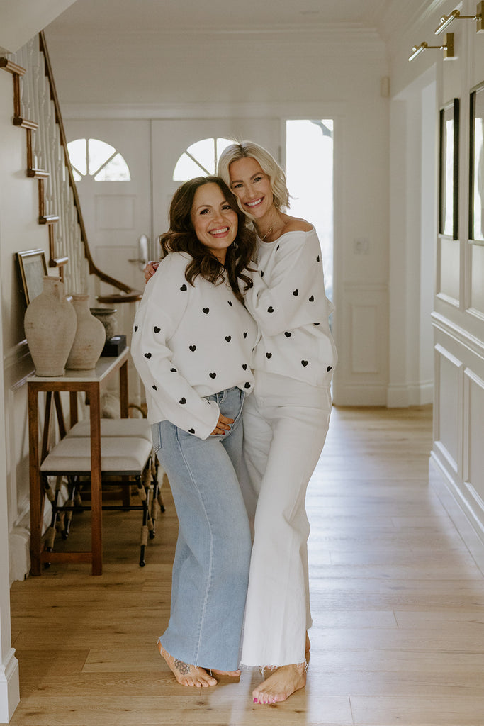 White Sweater with Black Hearts