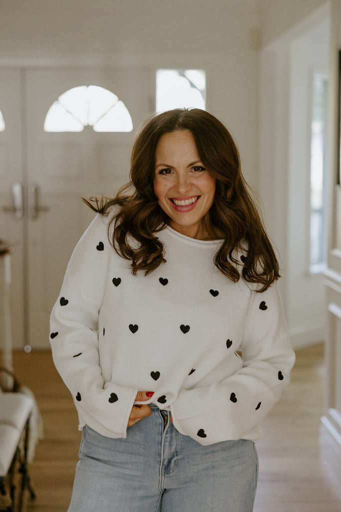 White Sweater with Black Hearts
