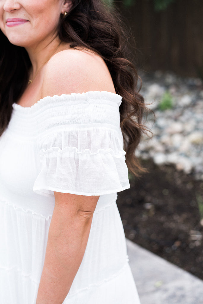 White smocked off the shoulder dress 2025